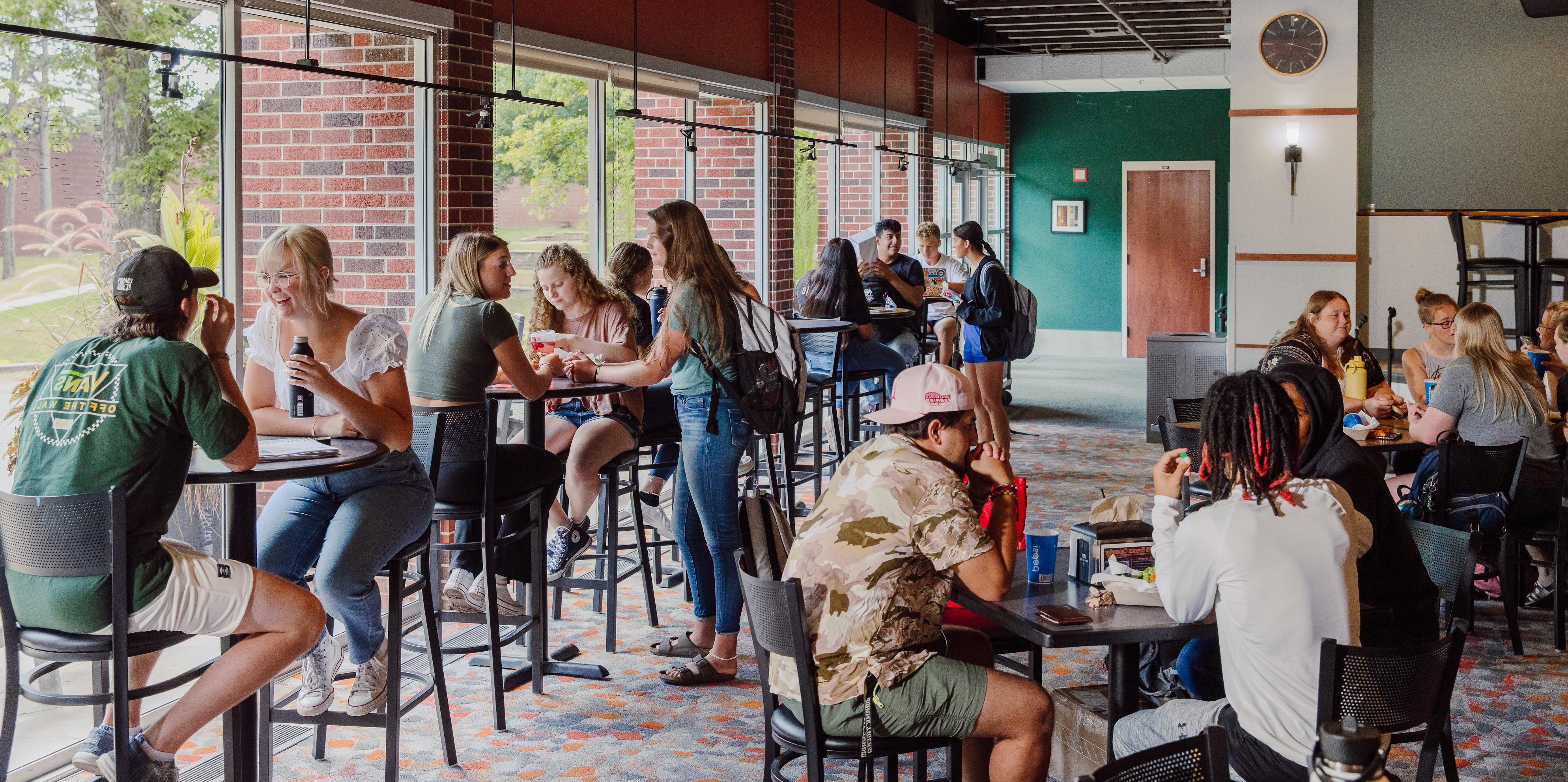 Students socializing in Perry Campus Center